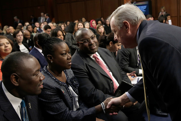Sybrina Fulton of Miami, Fla., mother of Trayvon Martin, greets Sen. Richard Durbin (D-IL) during a Senate Judiciary Committee hearing on "Stand Your Ground" laws October 29, 2013 in Washington, DC.
