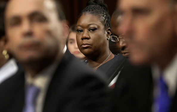 Sybrina Fulton of Miami, Fla., mother of Trayvon Martin, listens to Rep. Louis Gohmert (R) (R-TX) speak before a Senate Judiciary Committee hearing on "Stand Your Ground" laws October 29, 2013 in Washington, DC.