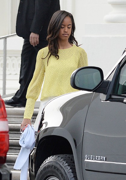 Malia Obama leaves the North Portico of the White House to attend a Church service April 20 2014 in Washington, DC.